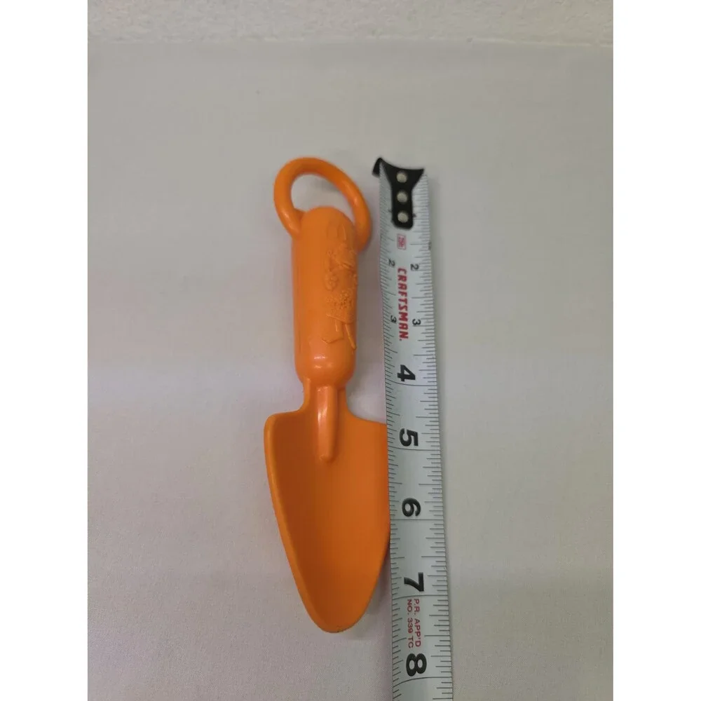 Vintage Collectable Kids Orange McDonalds Birdie the early bird garden shovel